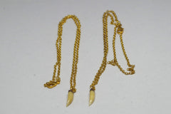 Stunning 18kt Gold Tooth Pendants