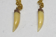 Stunning 18kt Gold Tooth Pendants