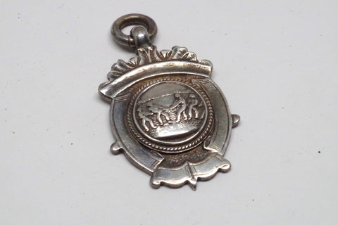 Snazzy Sterling Silver Tug of War Medal Charm