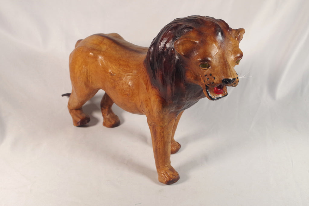 Gorgeous Antique Hide Lion Statue